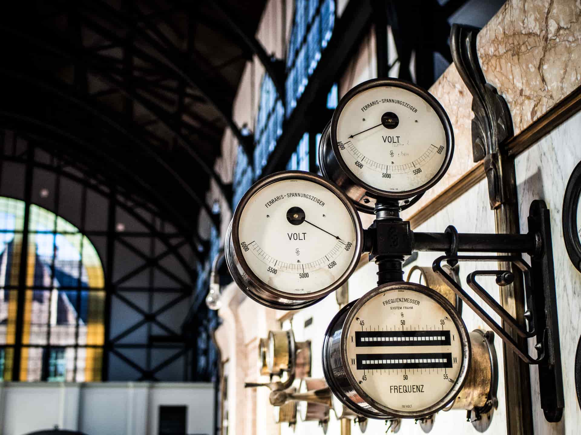 The dials of a mechanical residential electricity meter